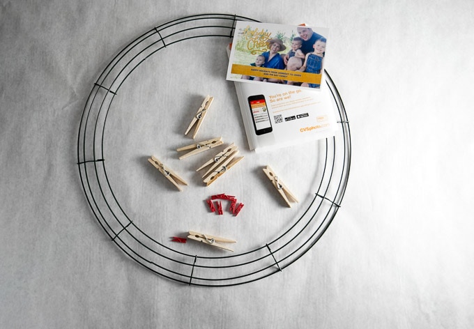 DIY Christmas card wreath takes less than an hour to make, and it can show off all the cards received over the holidays.