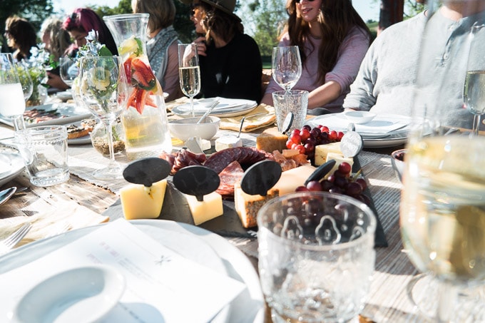 Food presentation tips from the happiest hosts: how to cover everything from drinks to dinner with minimal dishes and maximum effect.